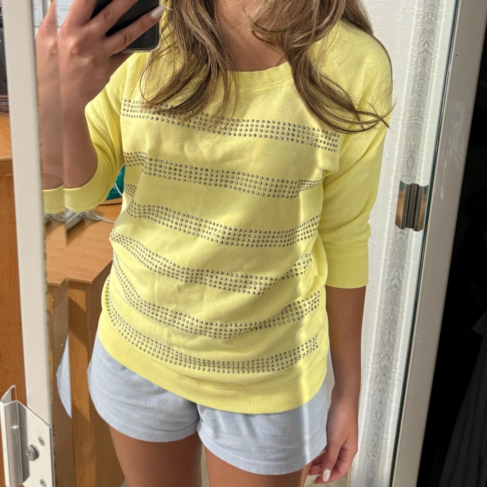 Pastel yellow Victoria’s Secret mid-sleeve sweater with sequins. Size small